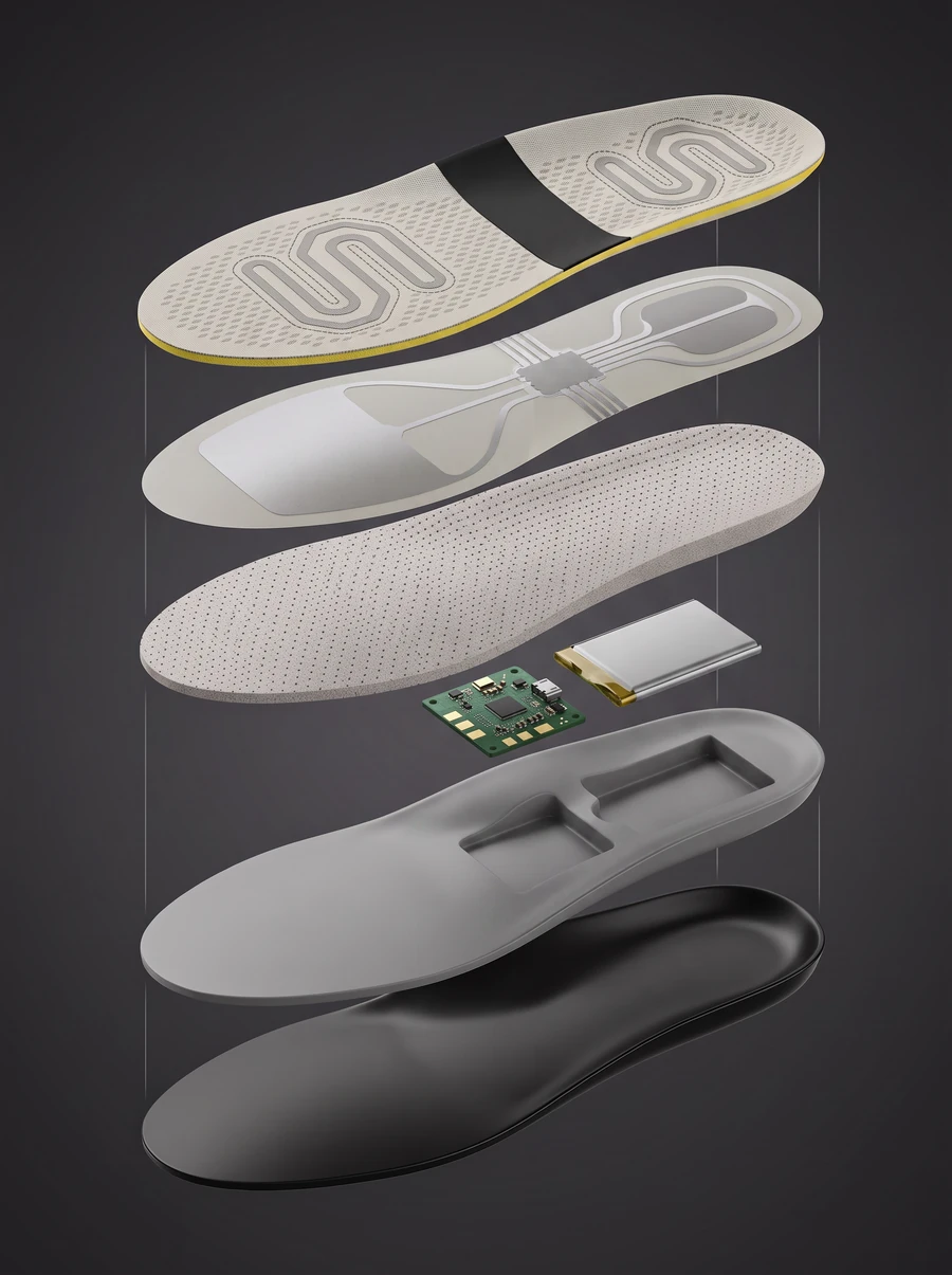 Exploded technical diagram of the Nexmove insole showing its six layers: cream conductive-fabric top printed with the N monogram, with N-shaped forefoot and heel electrode zones and a black EMS Reflexology Therapy insulating band across the midfoot, conductive ribbon layer, breathable performance foam, separated PCBA and battery modules, moulded PU arch-support board, and the TPU protective bottom cover that shields the heel and arch